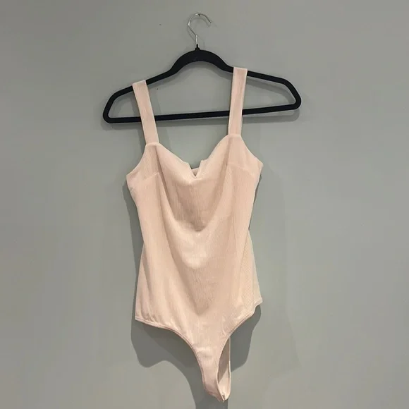 Bodysuit, never worn. - Picture 1 of 3